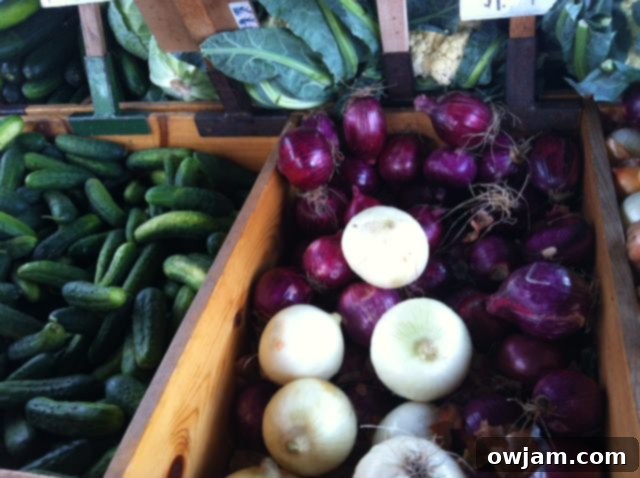 Assorted onions and cucumbers, excellent for enhancing an Heirloom Caprese Salad
