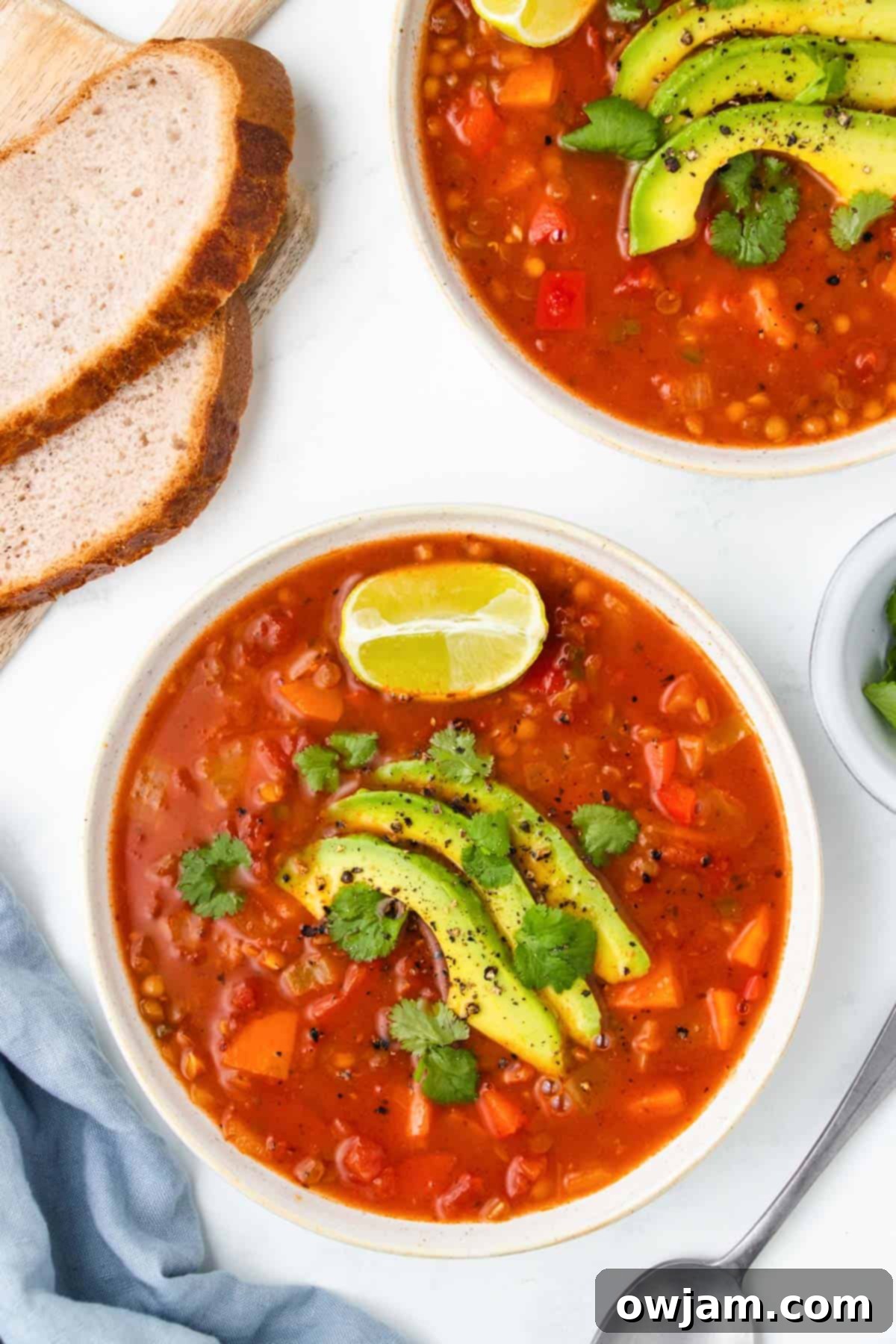 Mexican Lentil Soup 8 A serving of Mexican Lentil Soup in a white bowl, ready to be enjoyed.
