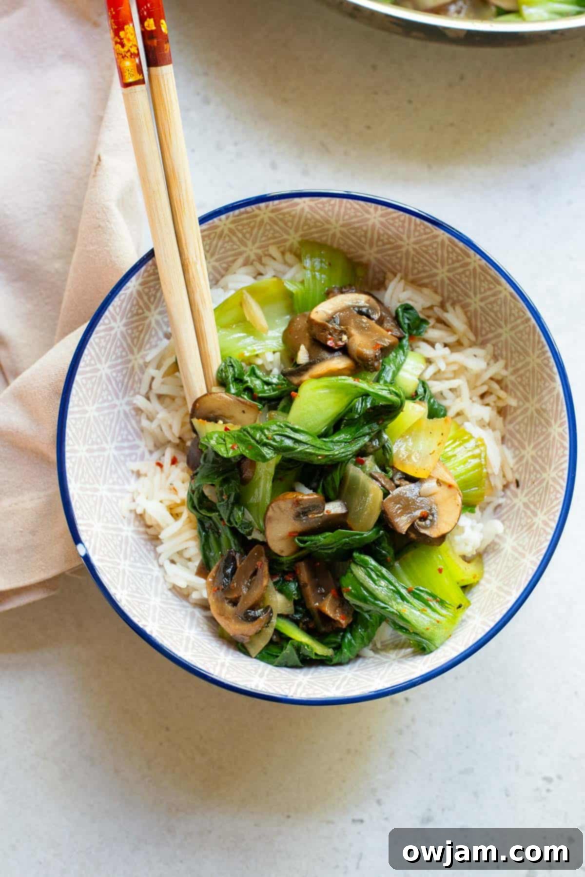 Crisp Garlic Bok Choy Stir Fry 3 Bok Choy Stir Fry in a bowl with chopsticks.