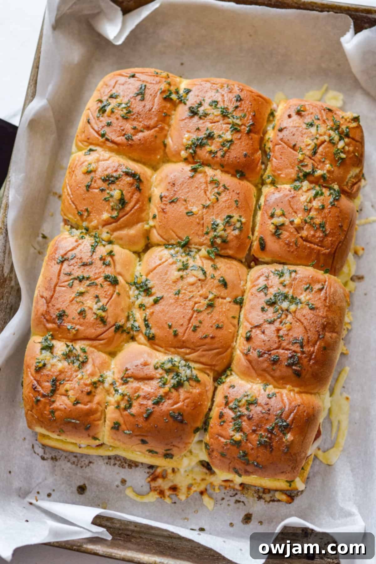 Speedy Chicken Parm Bites 15 Easy Chicken Parmesan Sliders on parchment paper