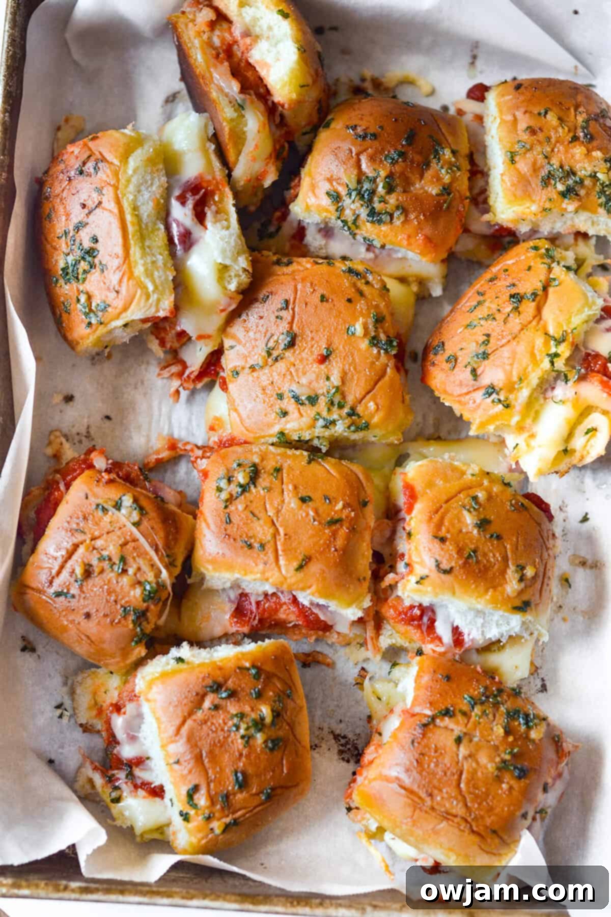 Speedy Chicken Parm Bites 5 Easy Chicken Parmesan Sliders on a baking sheet