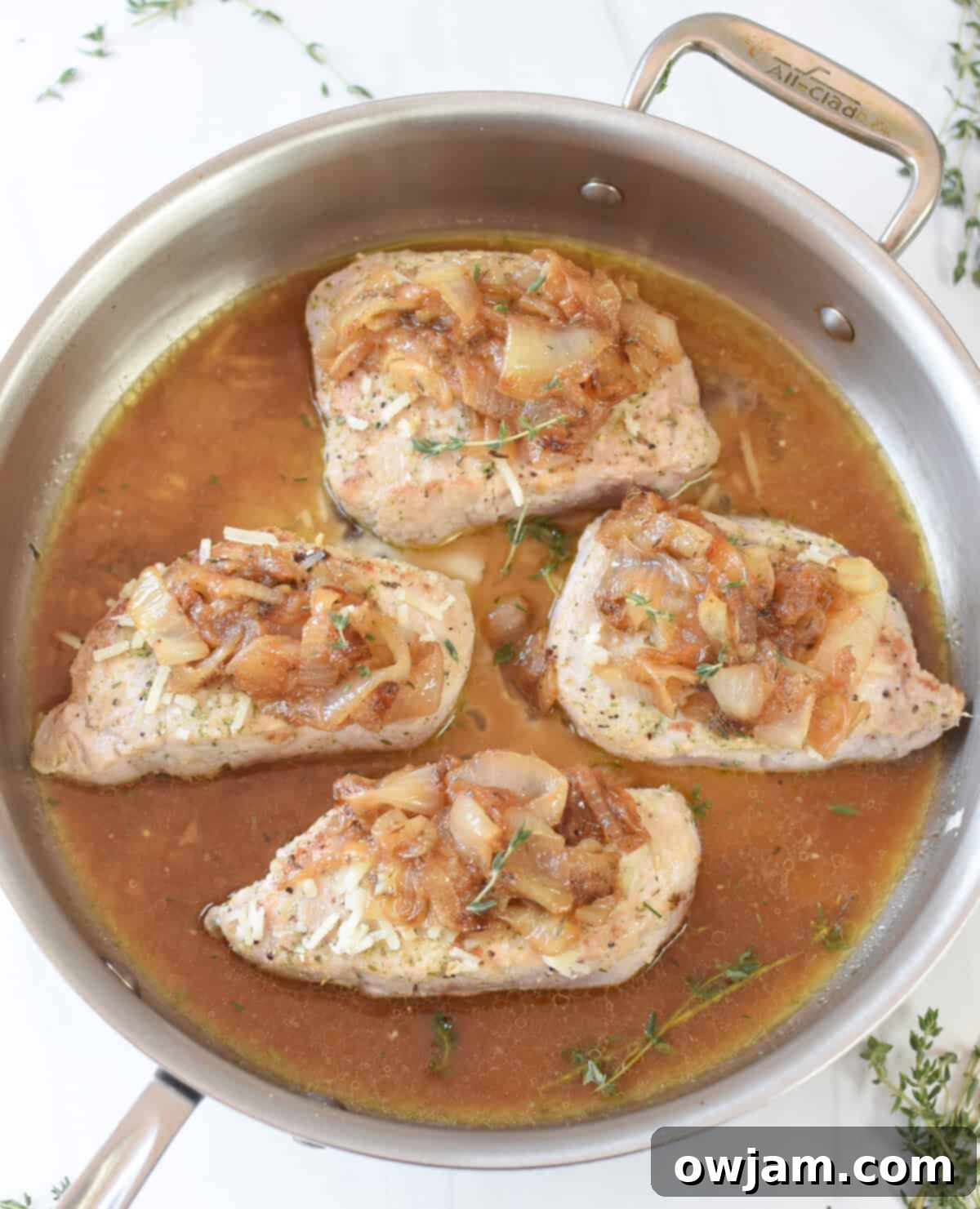 French Onion Pork Chops in a skillet 