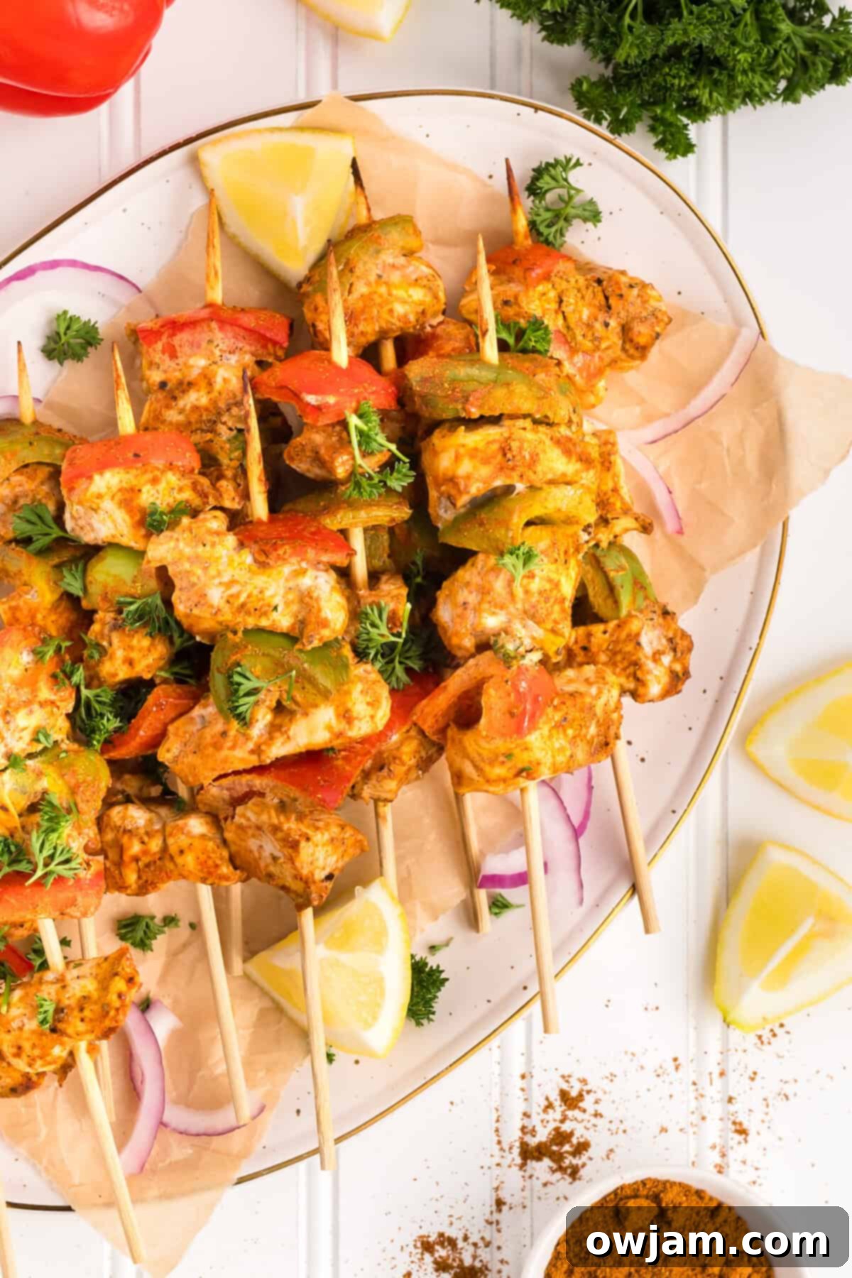 Flavorful Chicken Tikka Skewers 2 Chicken Tikka Kebabs on plate