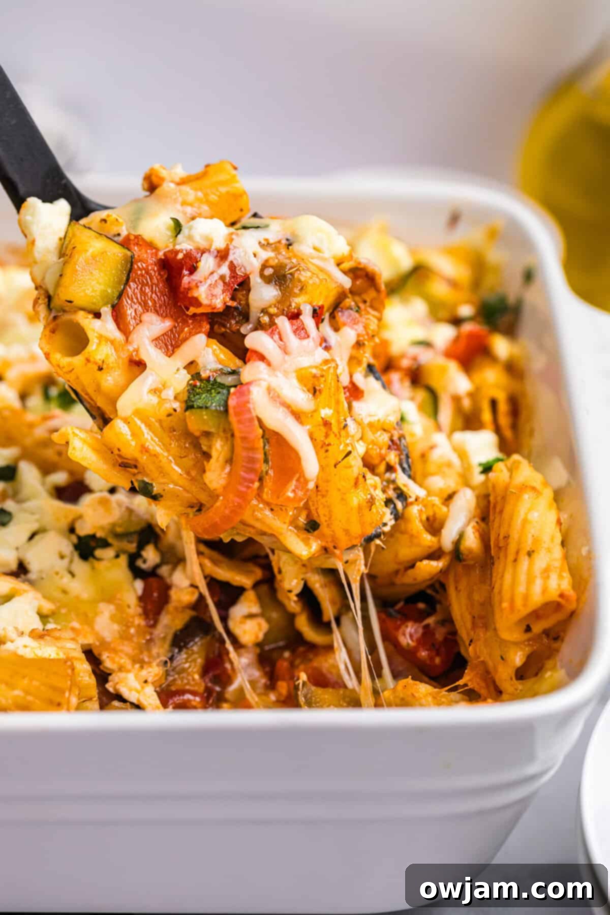 Mediterranean Roasted Vegetable Pasta Bake in a white pan 