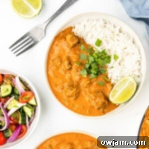 Succulent Lamb Curry Made Simple 13 Lamb Curry Image in white bowls with a fork and salad