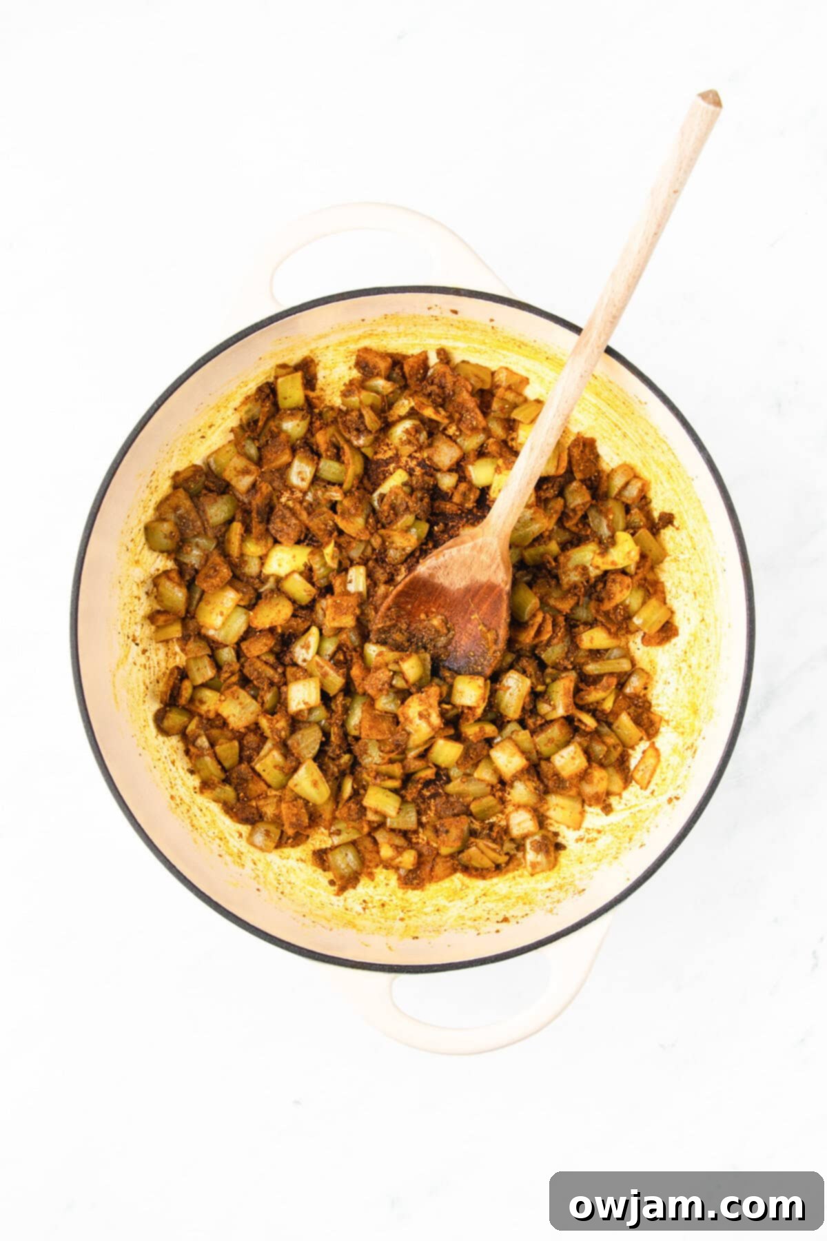 Succulent Lamb Curry Made Simple 7 Easy Lamb Curry Recipe onion and spices in pot