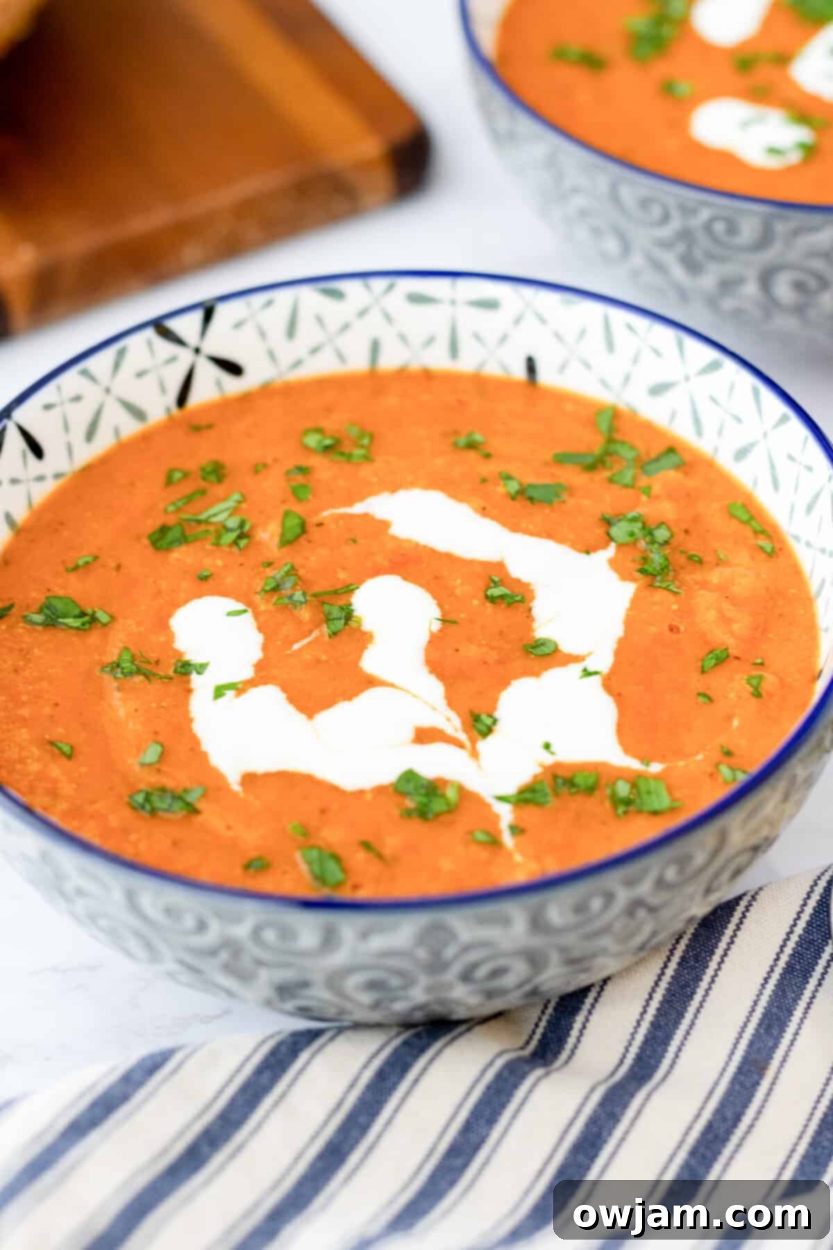 Spiced Tomato & Lentil Delight 9 A generous bowl of Lentil Tomato Soup, emphasizing its rich texture and appetizing appearance, ready to be enjoyed.