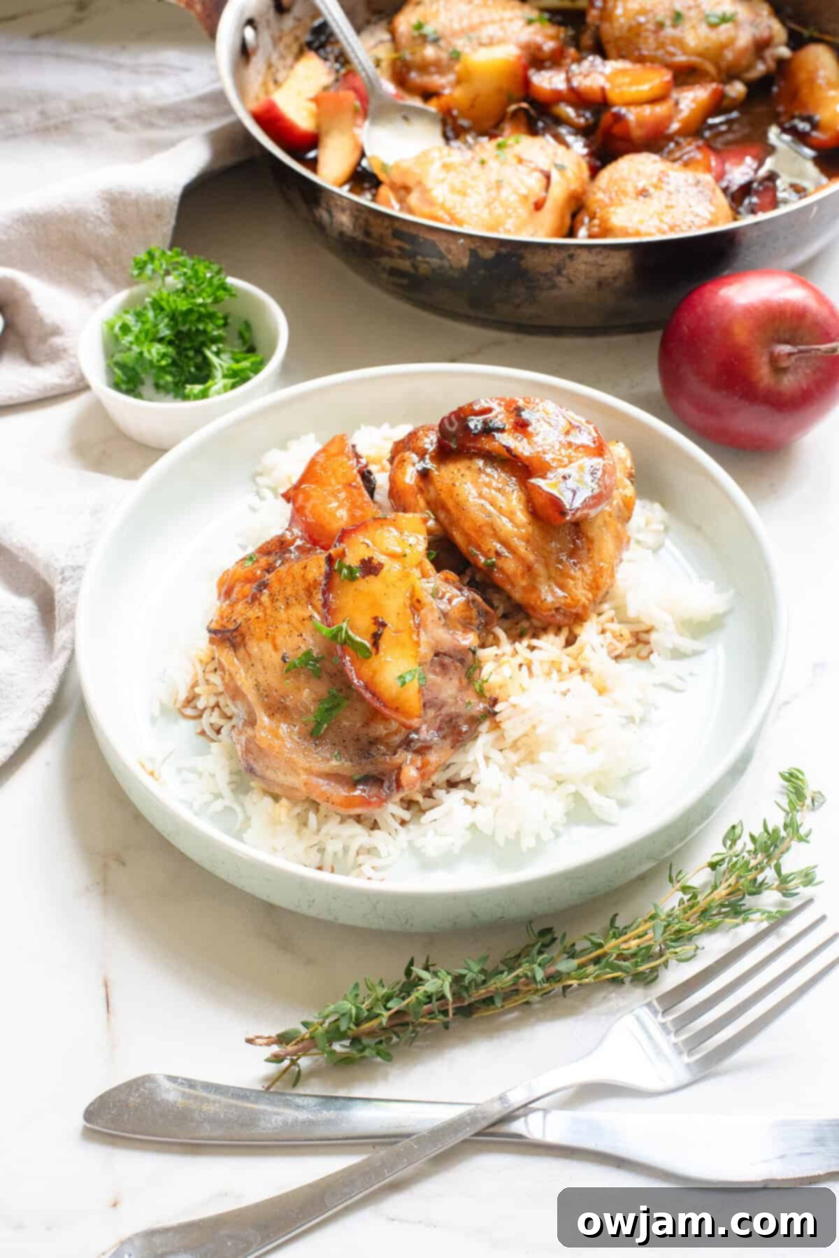 Golden Cider Chicken Skillet 7 Skillet Apple Cider Chicken on white plate