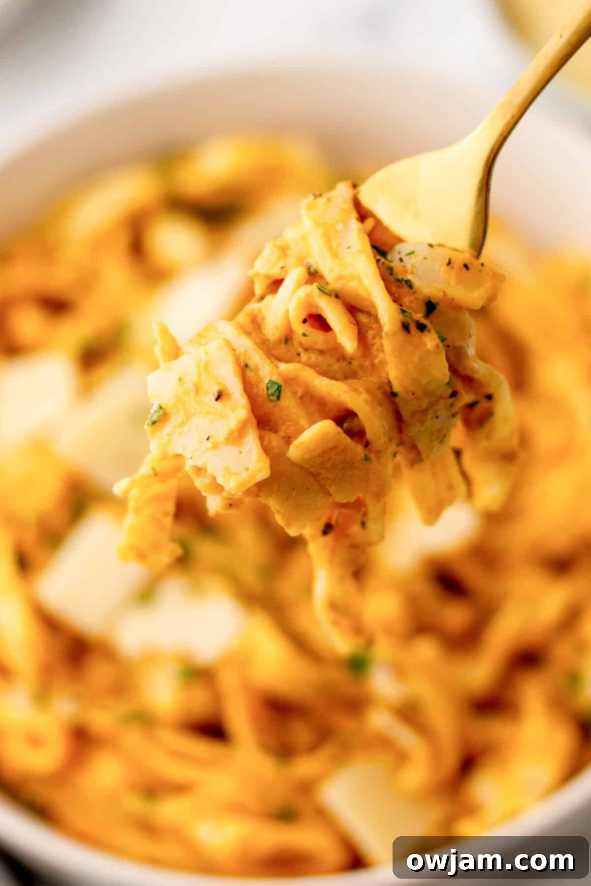 Velvety Pumpkin Pasta Sauce 4 Pumpkin Pasta Sauce on a fork