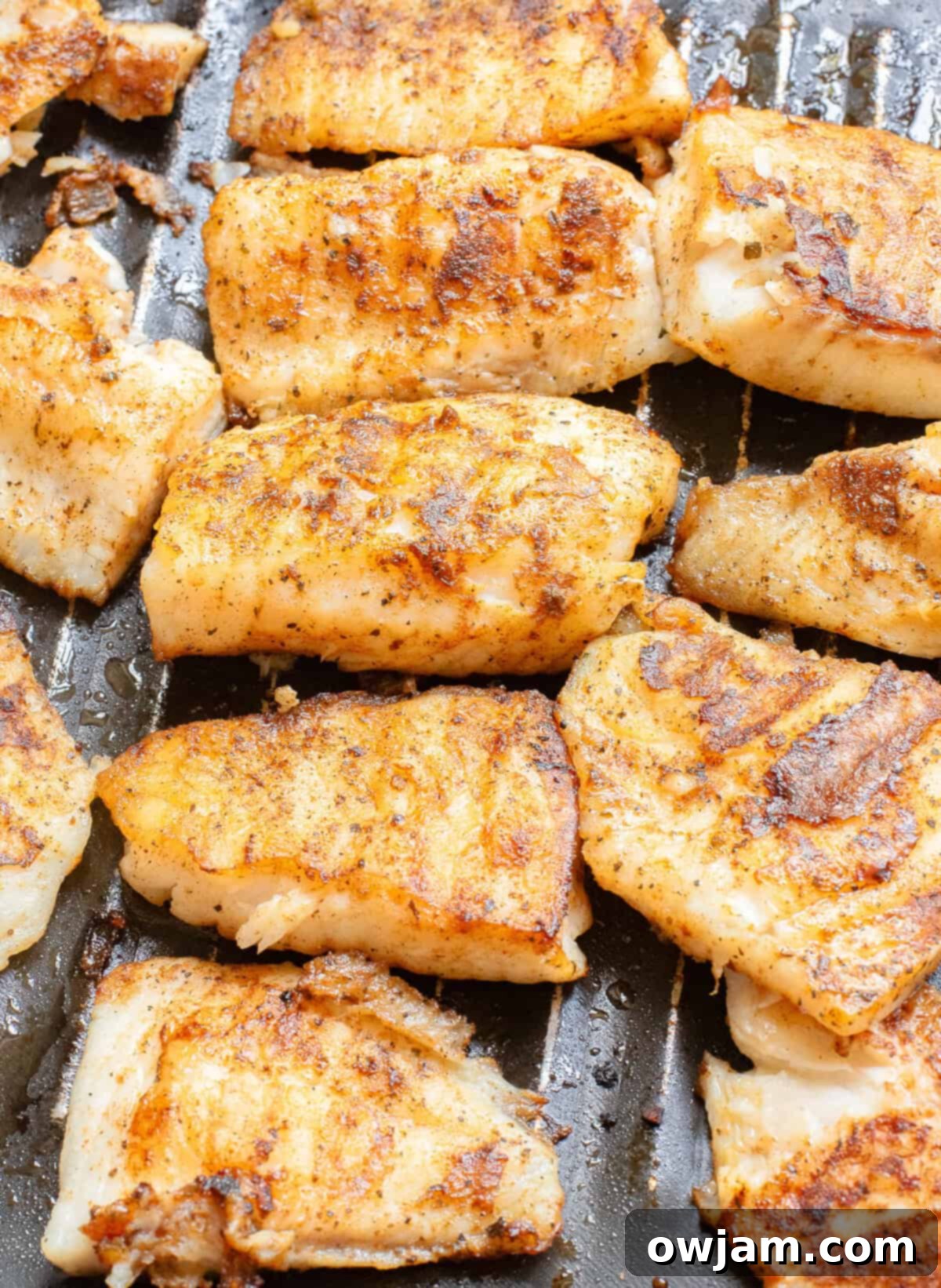 Flame-Kissed Fish Tacos 3 Blackened Fish Tacos in a skillet