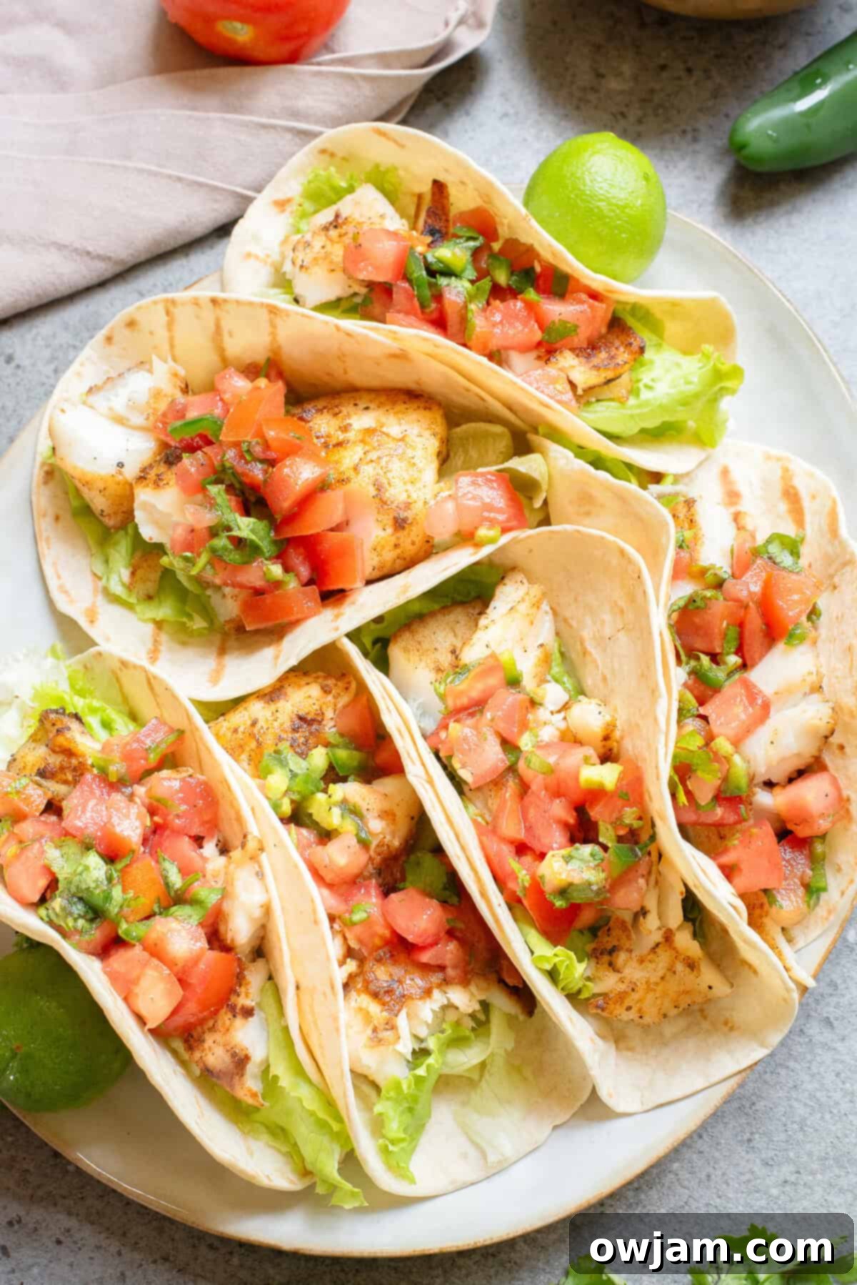 Flame-Kissed Fish Tacos 5 Blackened Fish Tacos tacos on a plate