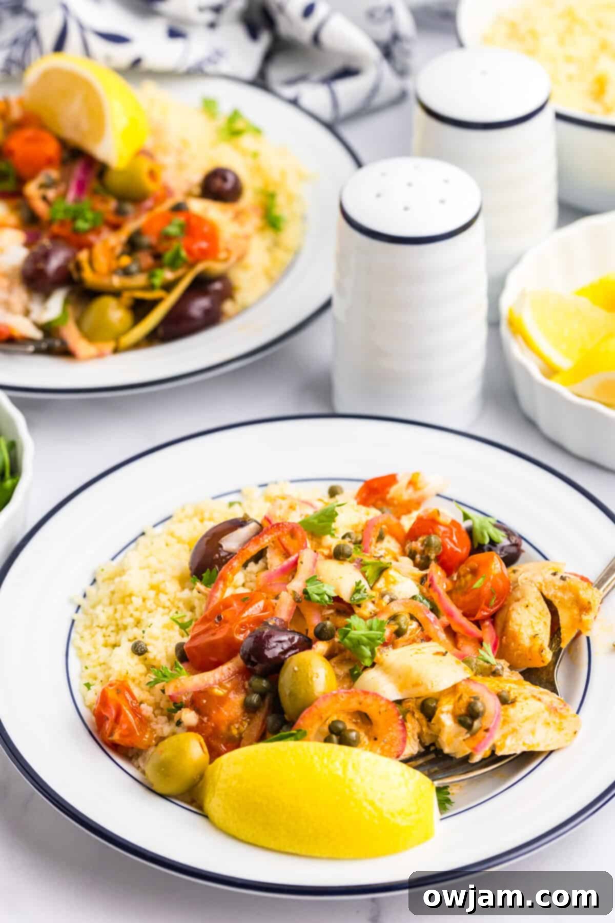 Sun-Kissed Mediterranean Fish Bake 6 Mediterranean Baked Fish two plates