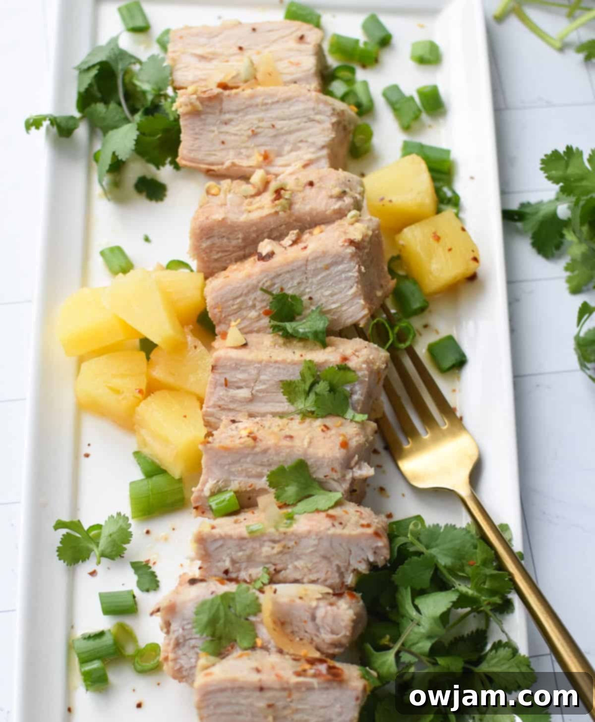 Hawaiian Pineapple Pork 3 Slow Cooker Pineapple Pork Loin on platter