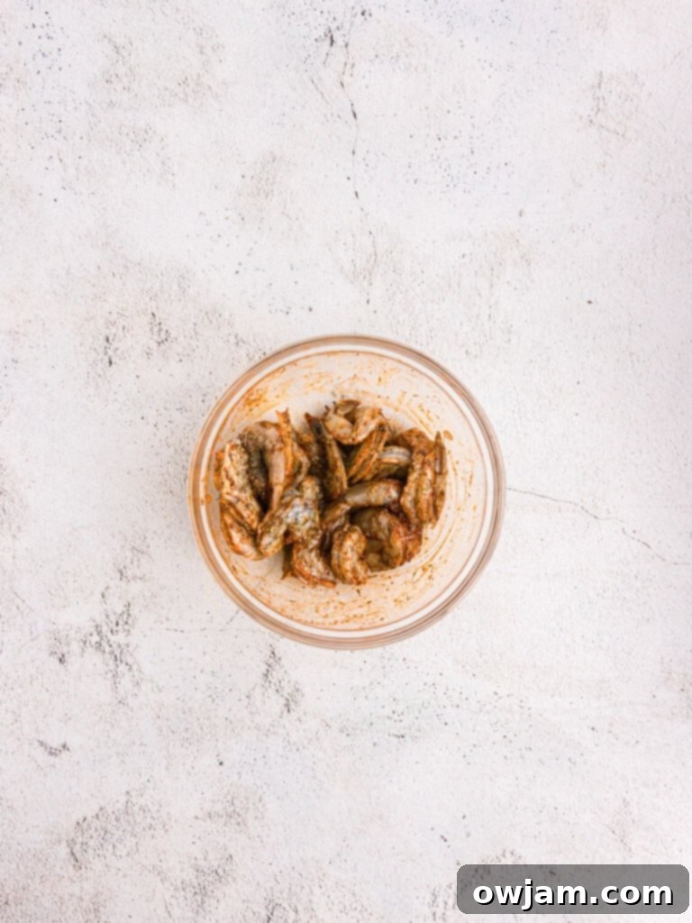 Shrimp seasoned with Italian spices in a bowl