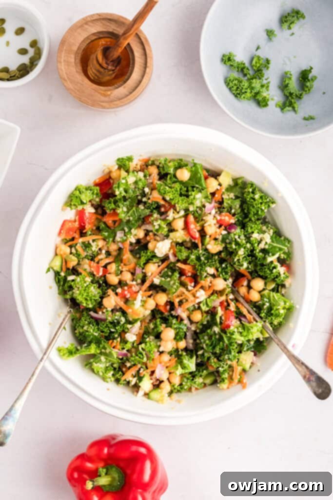 Healthy Kale Chickpea Salad 9 Kale Chickpea Salad ingredients in a bowl mixed together