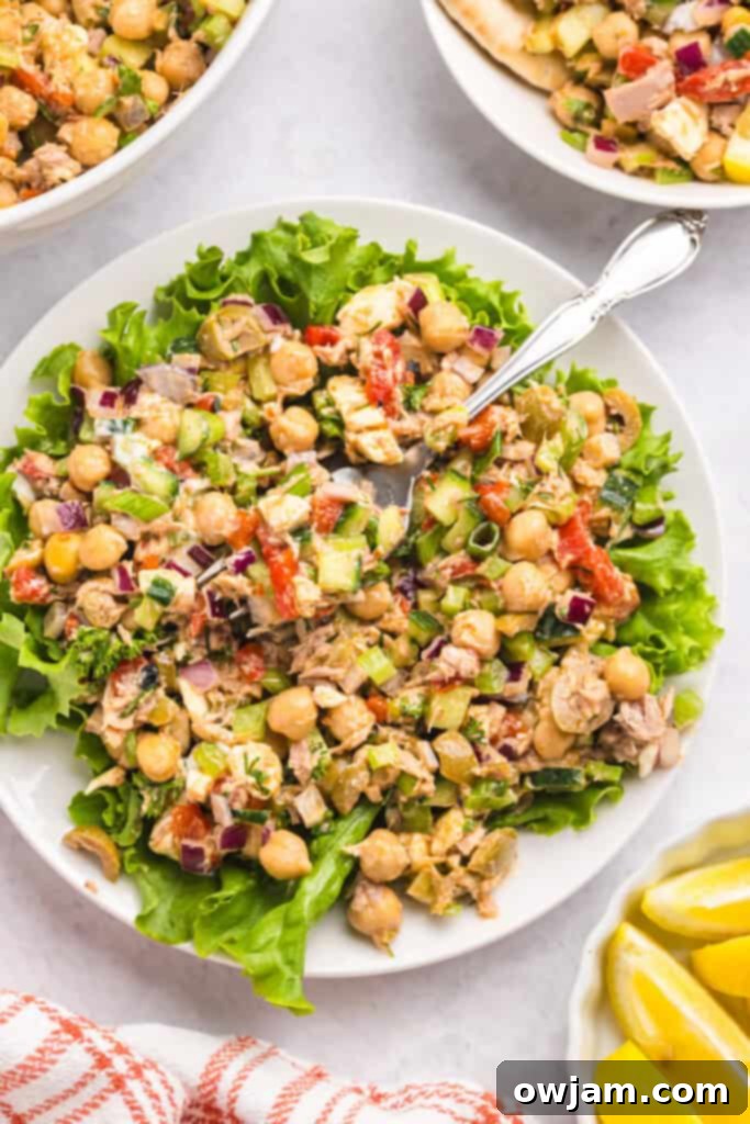 Refreshing Mediterranean Tuna and Chickpea Salad 3 Mediterranean Tuna and Chickpea Salad with lettuce in the background