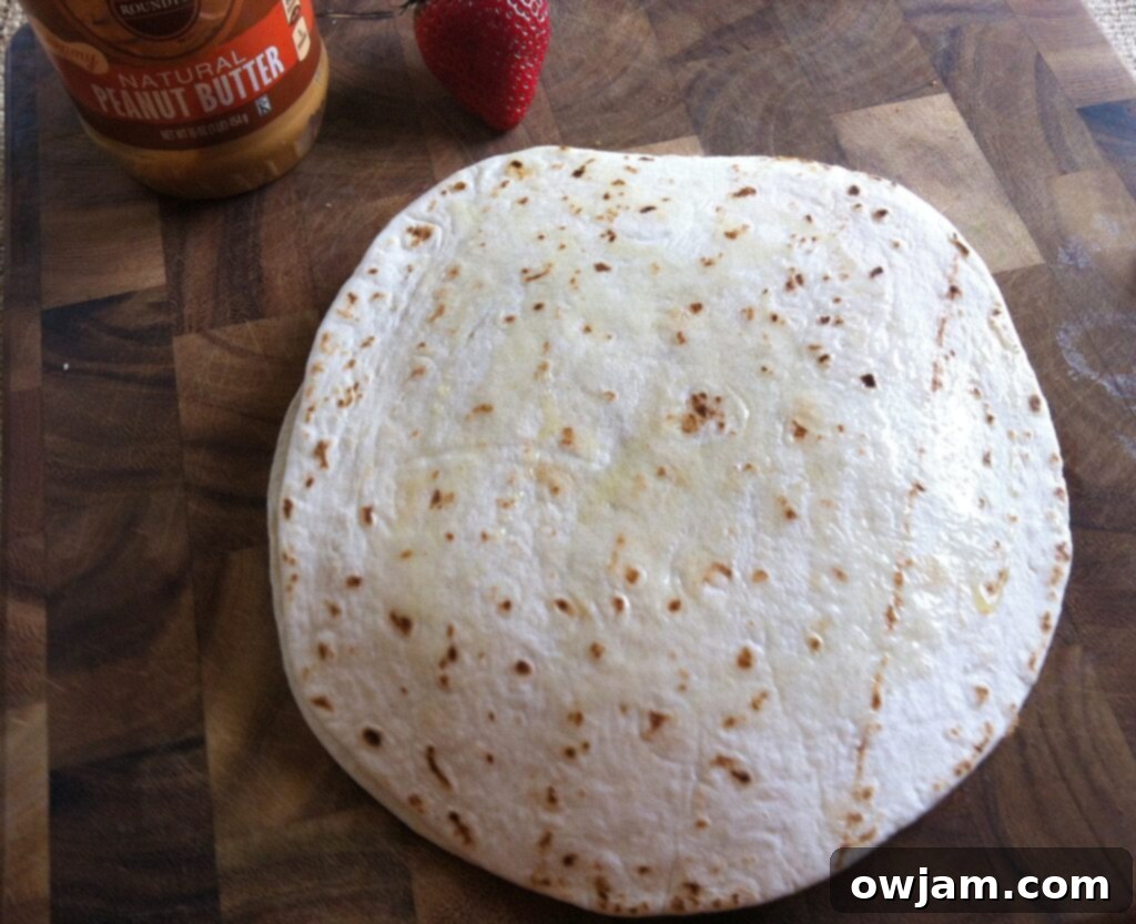 Ready-to-cook Dulce Quesadilla with its top tortilla placed.