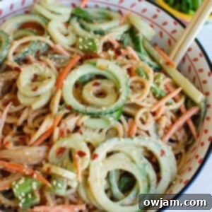 Sesame Noodles with a vibrant, creamy peanut sauce, ready to serve.