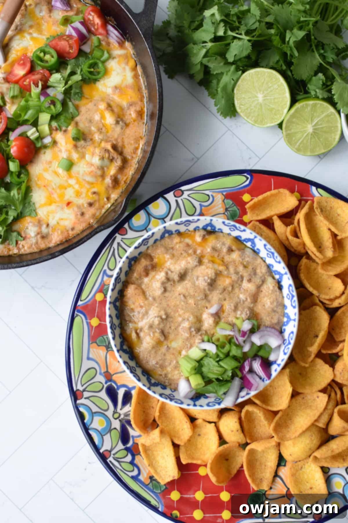 Beefy Cottage Cheese Queso 5 Cottage Cheese Queso in a small bowl with chips.