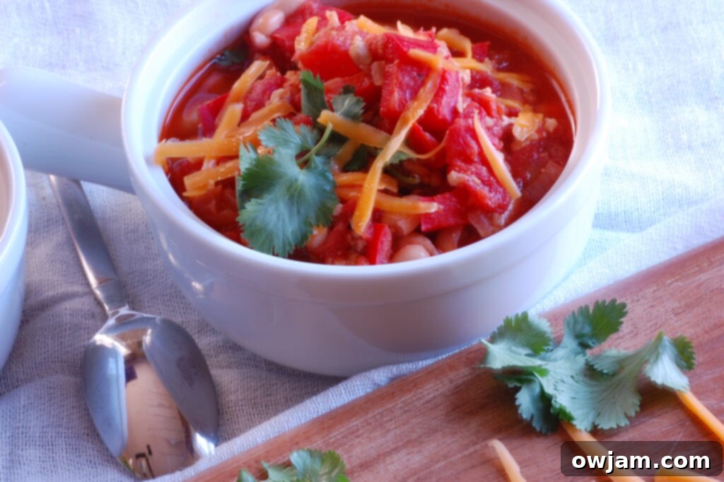 Close-up of a steaming bowl of Turkey and White Bean Chili, perfect for a cold day.