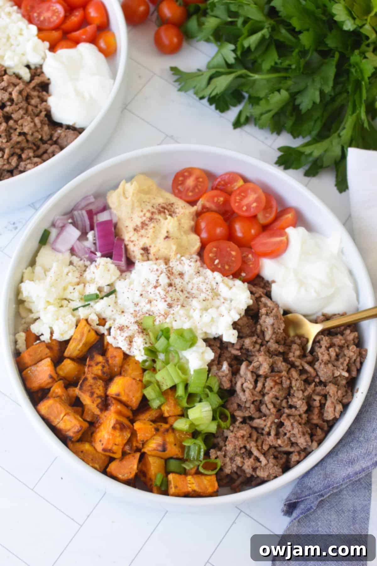 Hearty Sweet Potato Cottage Cheese Ground Beef Bowls 6 Sweet Potato Cottage Cheese Bowls with gold fork