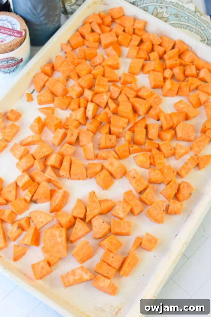 Hearty Sweet Potato Cottage Cheese Ground Beef Bowls 9 Sweet Potato Cottage Cheese Bowls with sweet potatoes roasting on a pan
