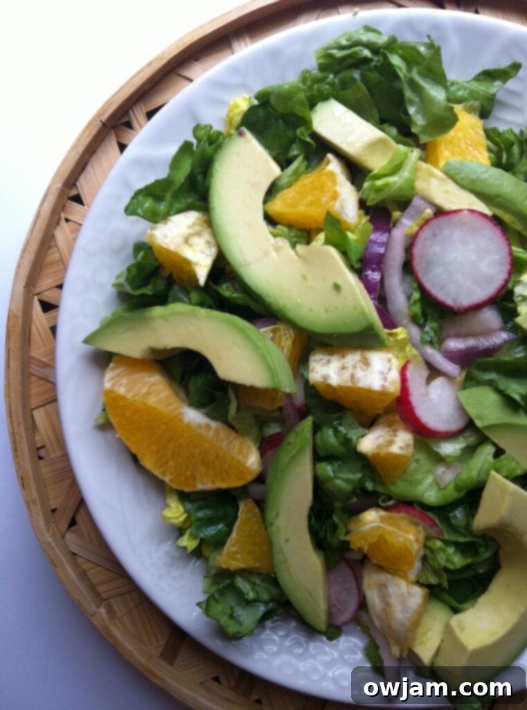 Close-up of a vibrant butter lettuce salad with fresh ingredients
