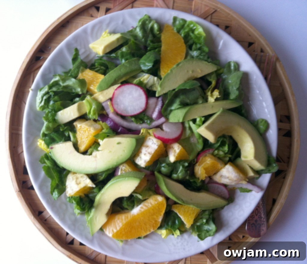 Elegant Butter Lettuce Salad with oranges, avocado, and red onion