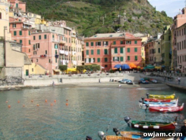 Decadent Cinnamon Swirl Coffee Cake 2 Picturesque view of Cinque Terre's colorful coastal villages and clear waters.