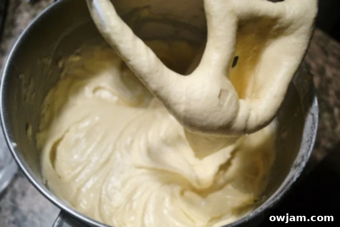 Decadent Cinnamon Swirl Coffee Cake 4 Thick and creamy coffee cake batter in a mixing bowl, ready for baking.