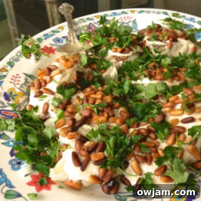 Flaky Baked White Fish Made Simple 2 Easy Baked White Fish Recipe with parsley and lemon slices.