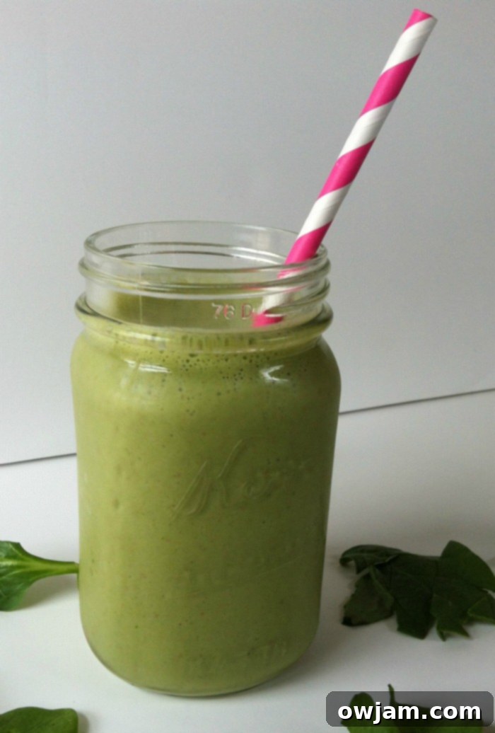 Green Smoothie in a glass, ready to be enjoyed