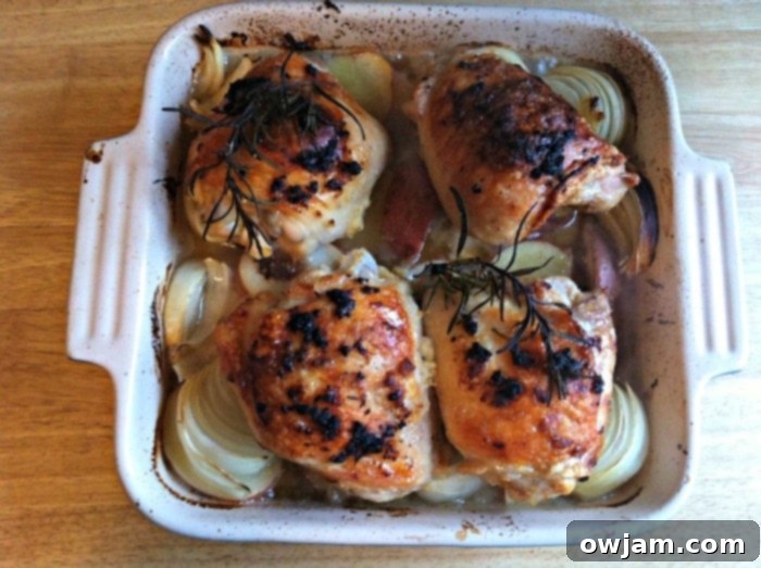 Delicious Roasted Lemon Rosemary Chicken and Red Potatoes dinner served with fresh herbs