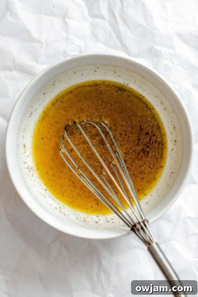 The whisked lemon vinaigrette dressing for Summer Orzo Pasta Salad.