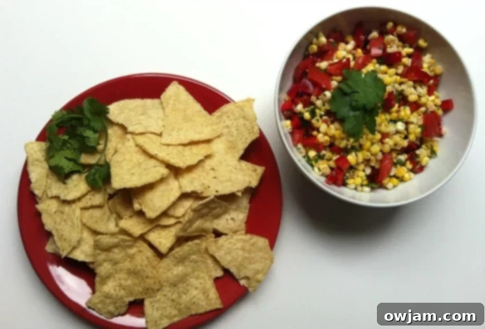 Chips and salsa bowl featuring fresh Grilled Corn Salsa