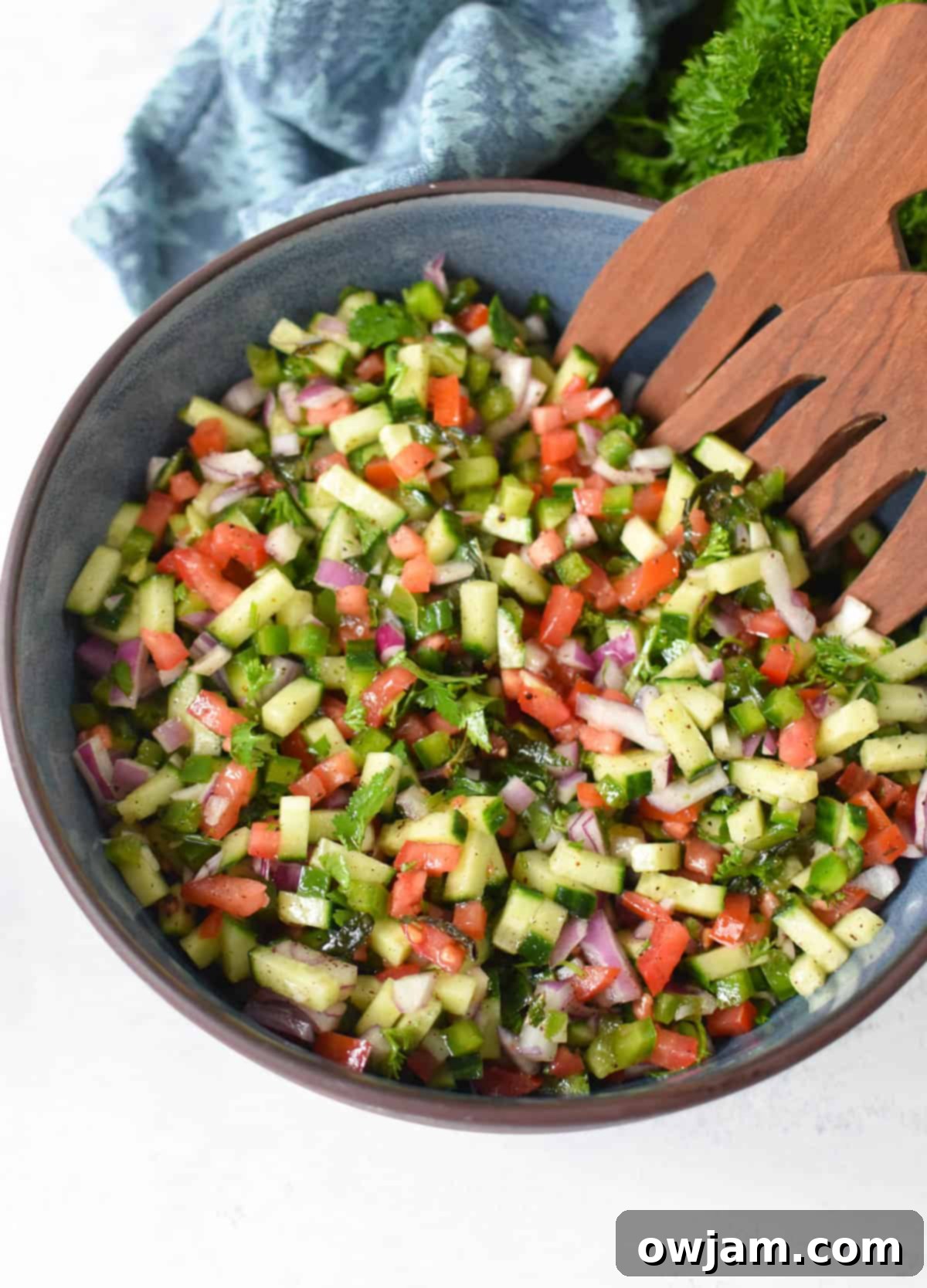 Shirazi Salad Recipe with spoons