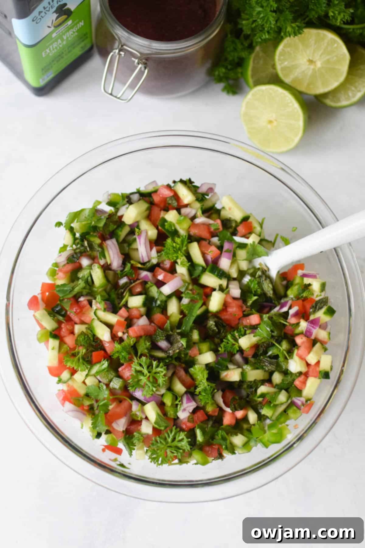 Shirazi Salad Recipe mixed in clear bowl