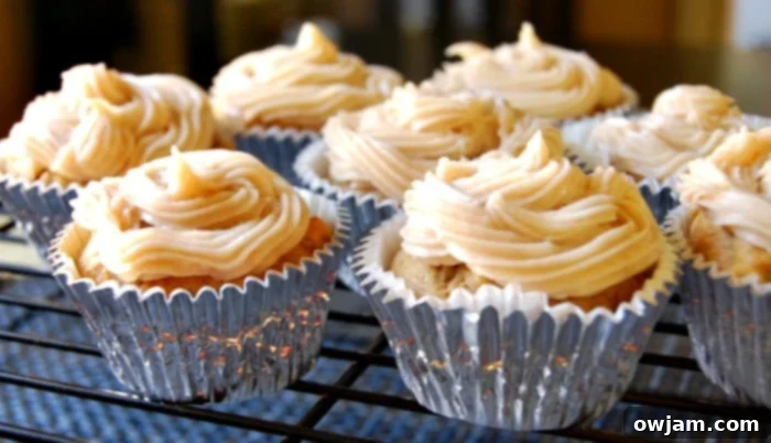 Pumpkin Cupcakes with Maple Cinnamon Cream Cheese Frosting, decorated for fall