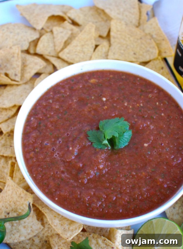 Zesty Homemade Perfection 6 Homemade Salsa in a white serving dish on a wooden platter