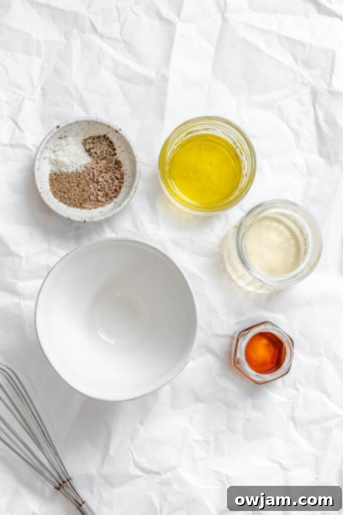 Lightened Up Coleslaw 5 Ingredients for healthy coleslaw dressing, including olive oil, vinegar, honey, and spices.