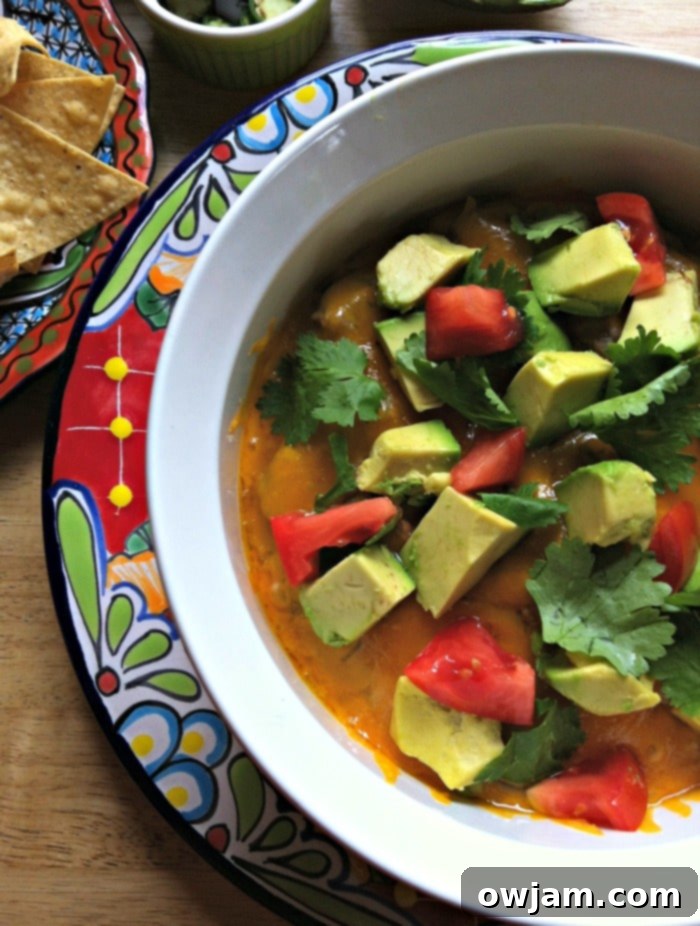 Baked Avocado Black Bean Dip with fresh garnishes