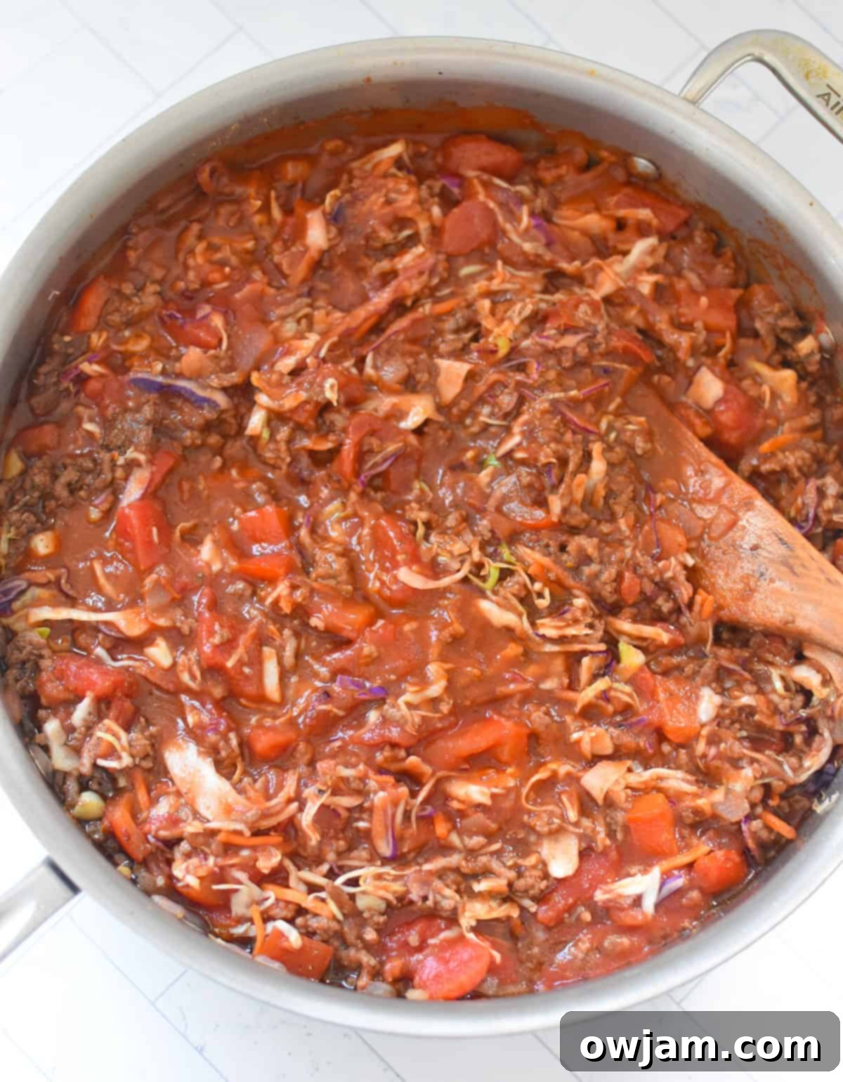Mediterranean Beef Cabbage Skillet 10 Mediterranean Beef and Cabbage Stir-fry with wooden spoon