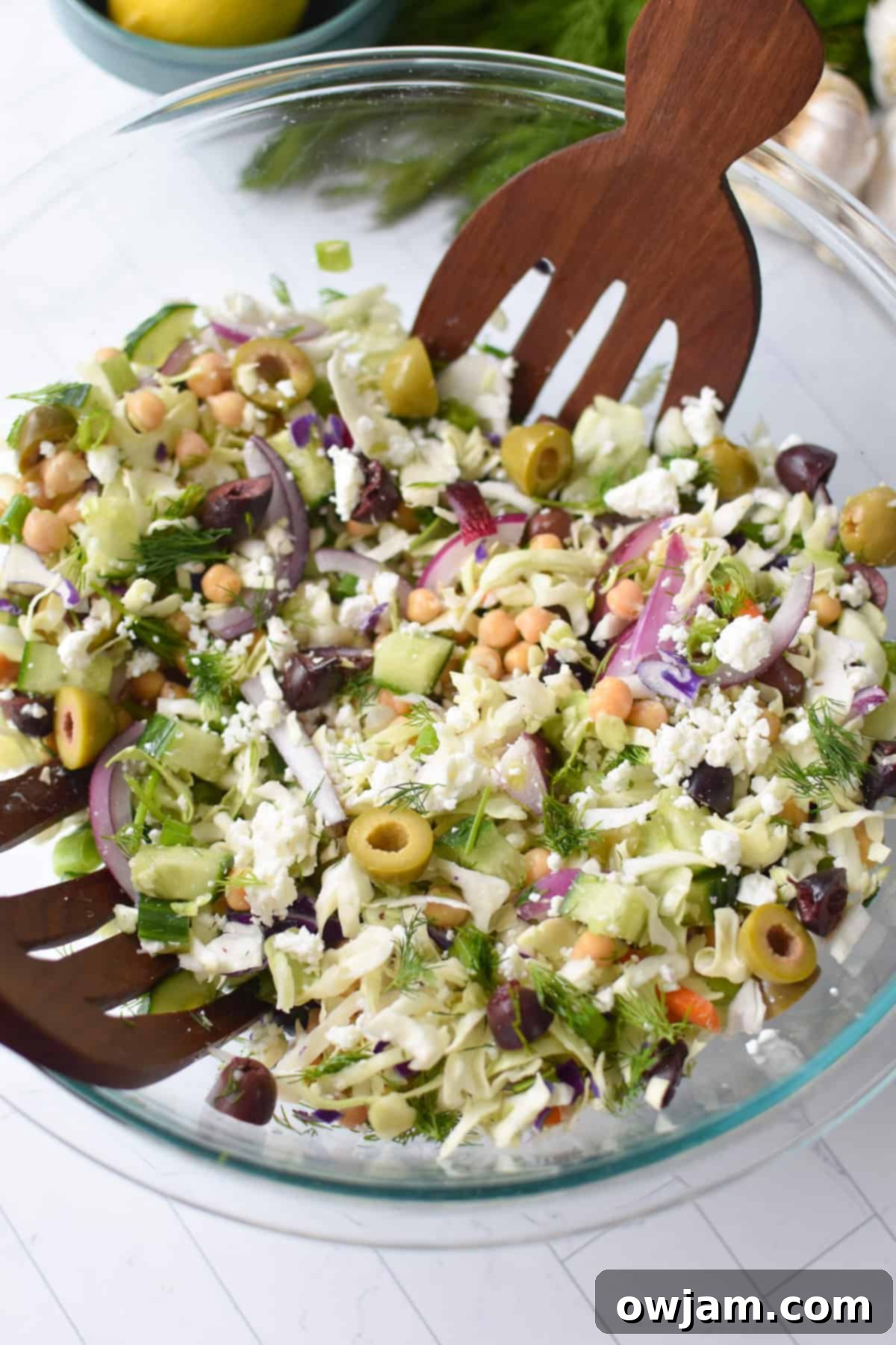 Greek Cabbage Slaw Salad mixed in a large bowl