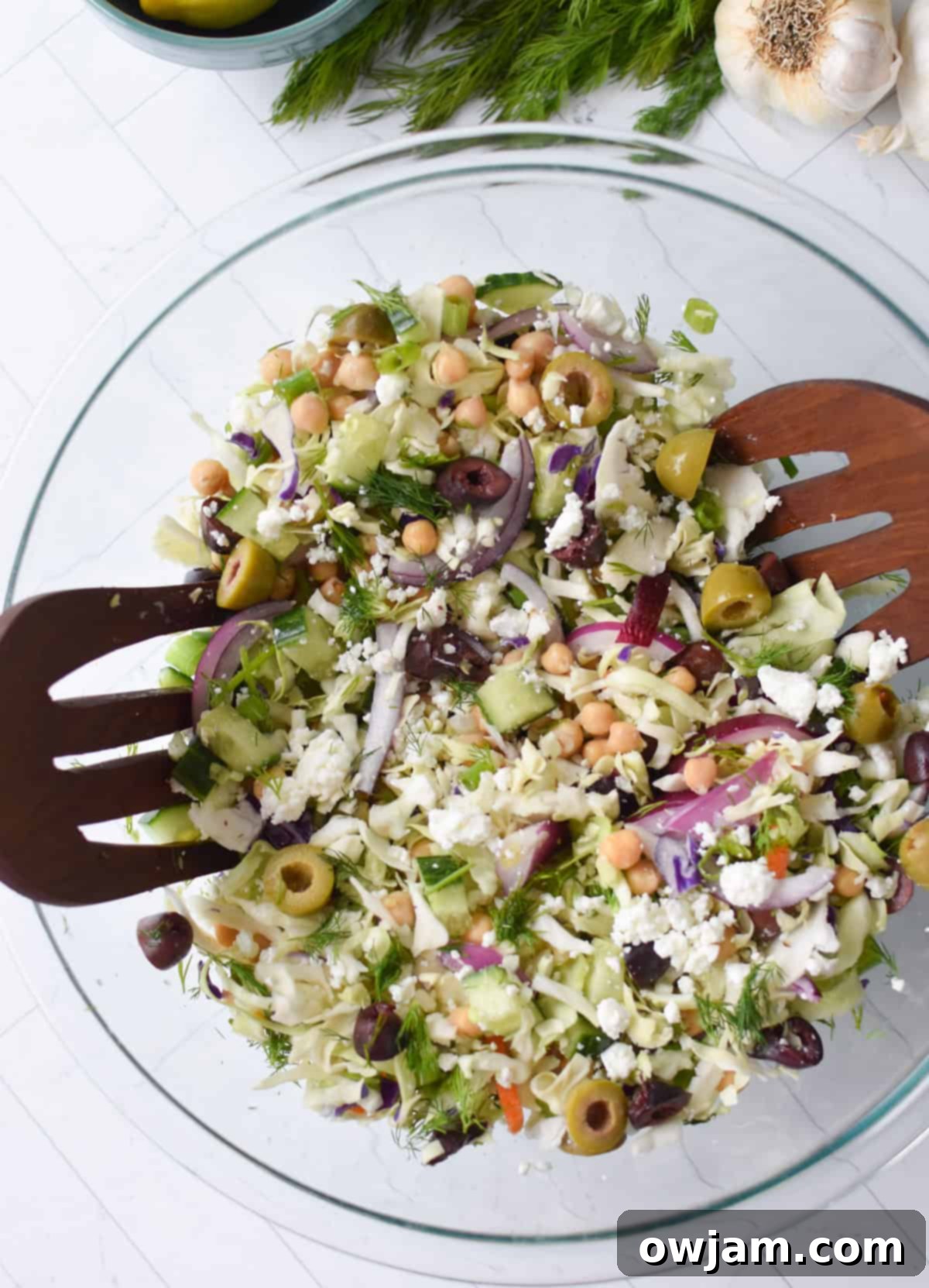 Greek Cabbage Salad mixed in a bowl
