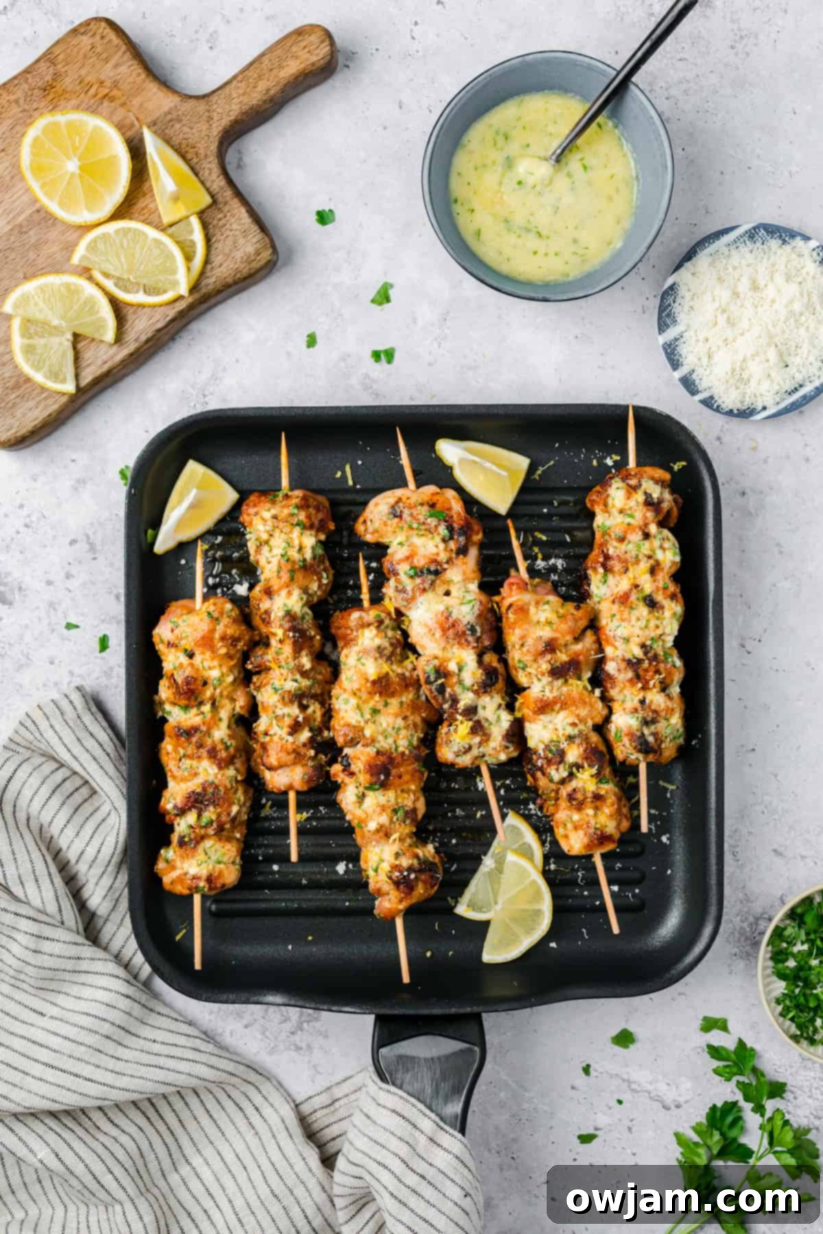 Garlic Parmesan Chicken Skewers on grill pan