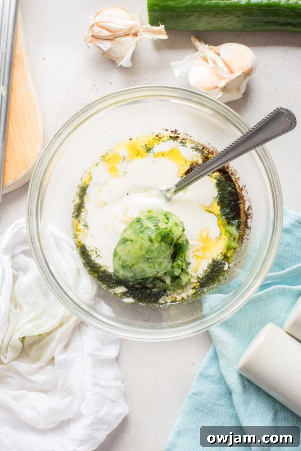 Cool and Creamy Tzatziki in a bowl with a spoon