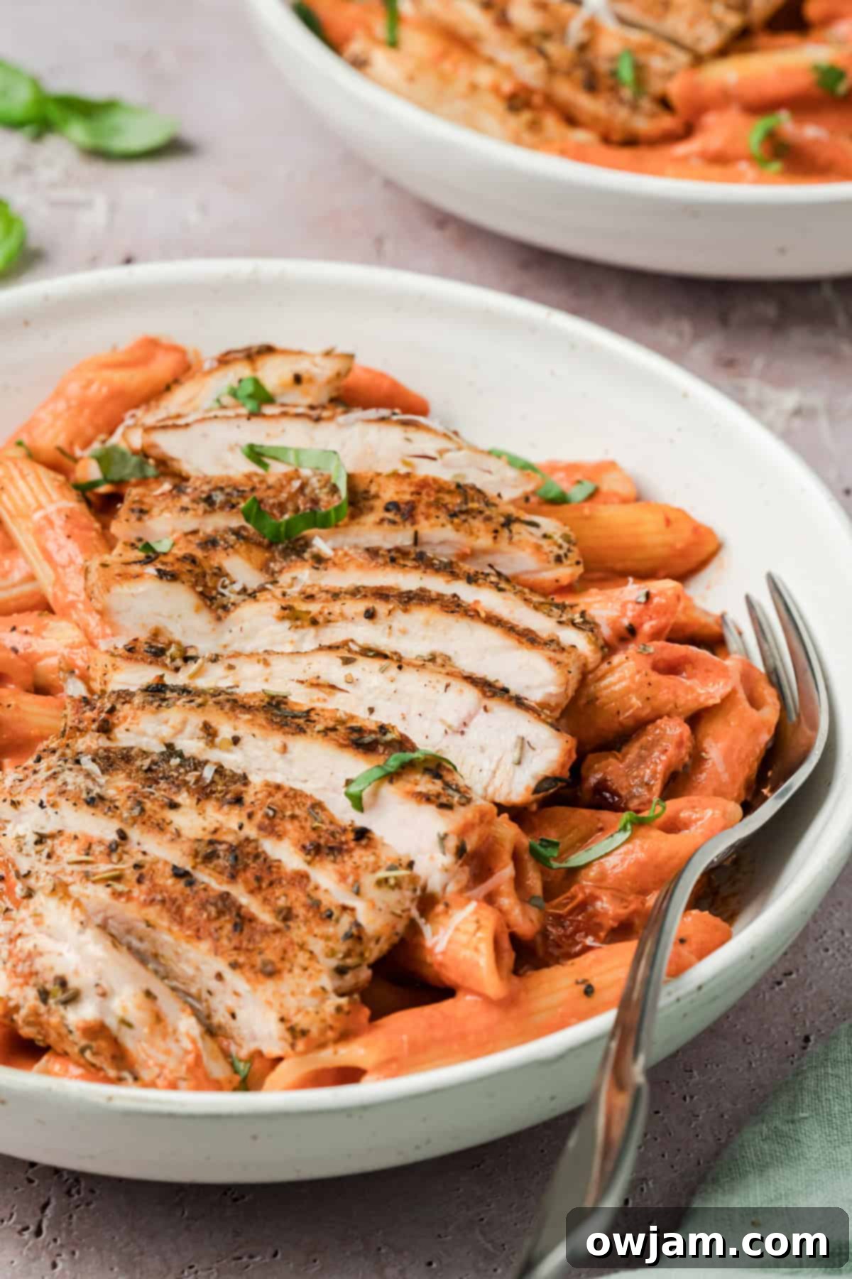 Creamy Tomato Chicken Pasta Perfection 11 Creamy Tomato Chicken Pasta recipe with fork