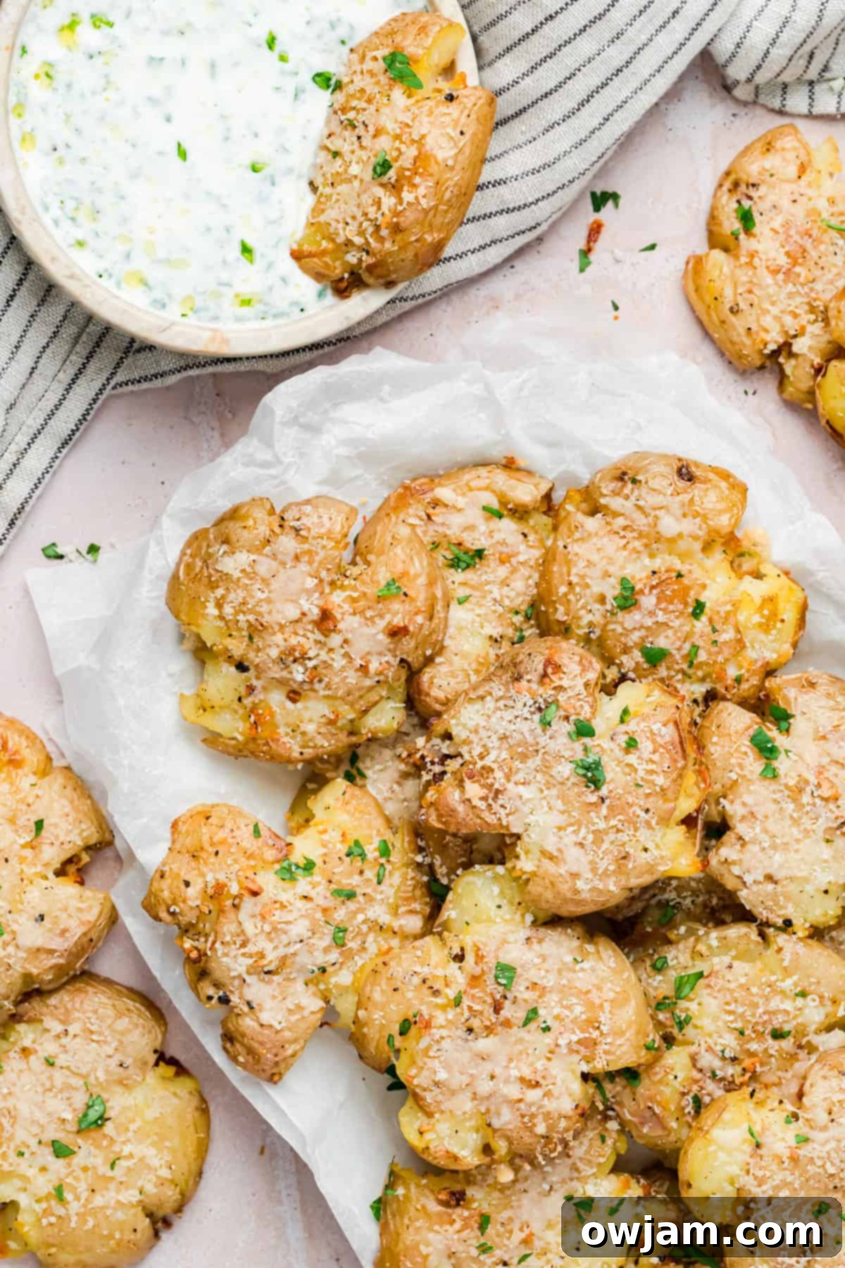 Garlic Parmesan Smashed Potatoes 4 Oven baked garlic smashed potatoes with herbs