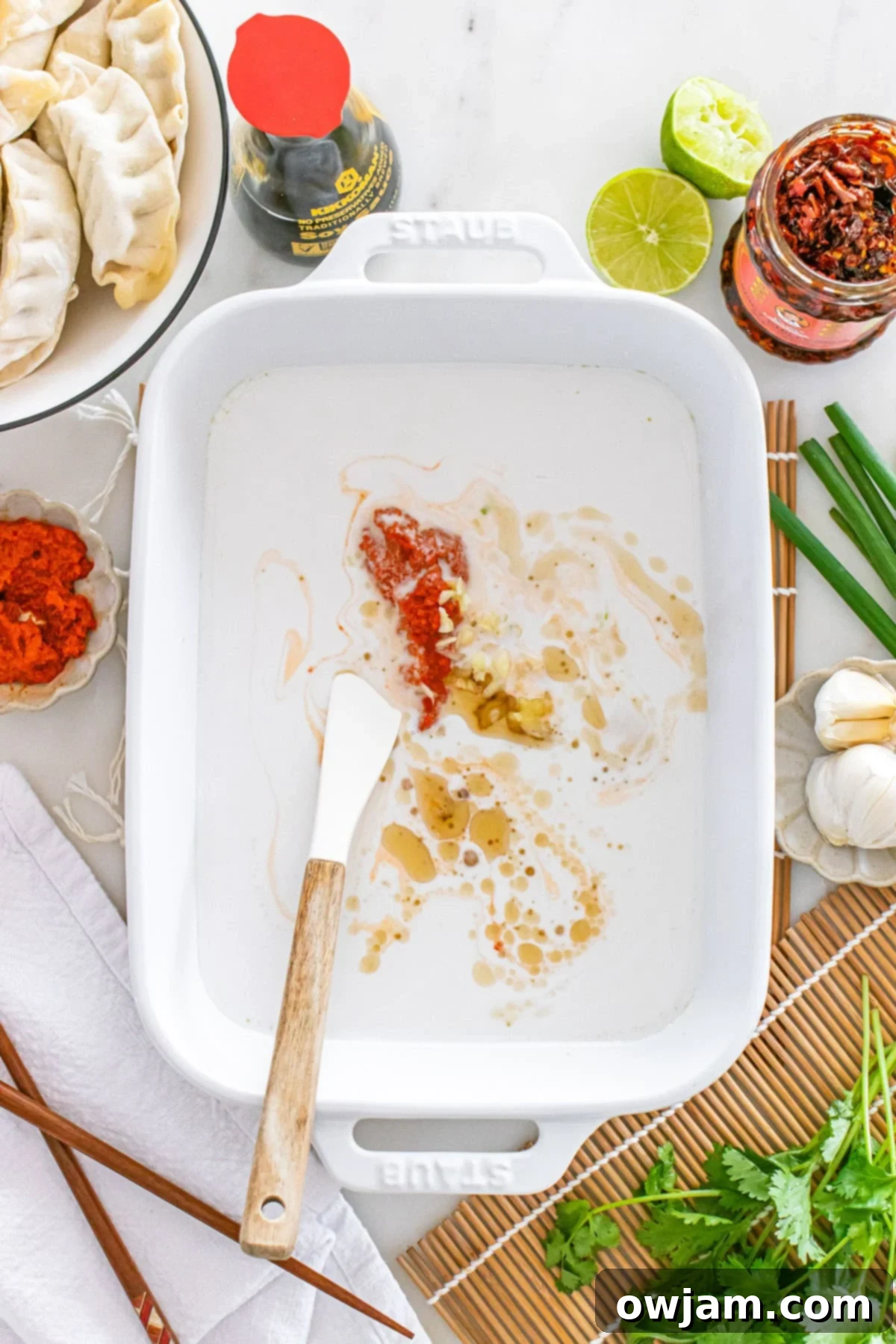 Sheet Pan Dumpling Dinner 8 Baked Dumpling Sauce in pan